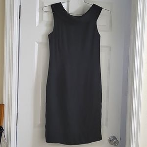 Little Black Dress. Shawl collar, V-shape, zipper in  back of dress.